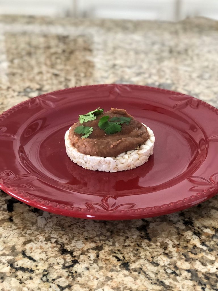 Brown rice cake with refried beans, salsa and cilantro - A Sample Daniel Fast Meal Plan | Millennials with Meaning